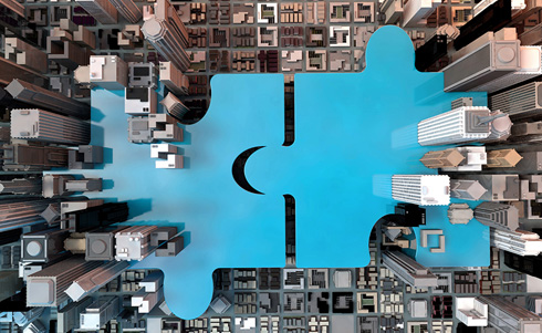 Overhead view of a city fitting together like a puzzle