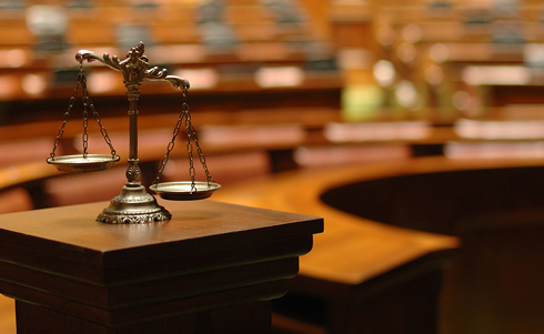 Scales of Justice in a court room