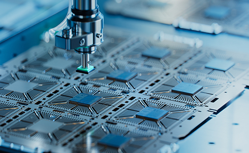 Close-up of Silicon Die are being Extracted from Semiconductor Wafer and Attached to Substrate by Pick and Place Machine. Computer Chip Manufacturing at Fab. Semiconductor Packaging Process.