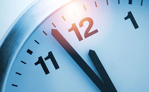 Clock hands approaching 12, symbolizing the year-end deadline